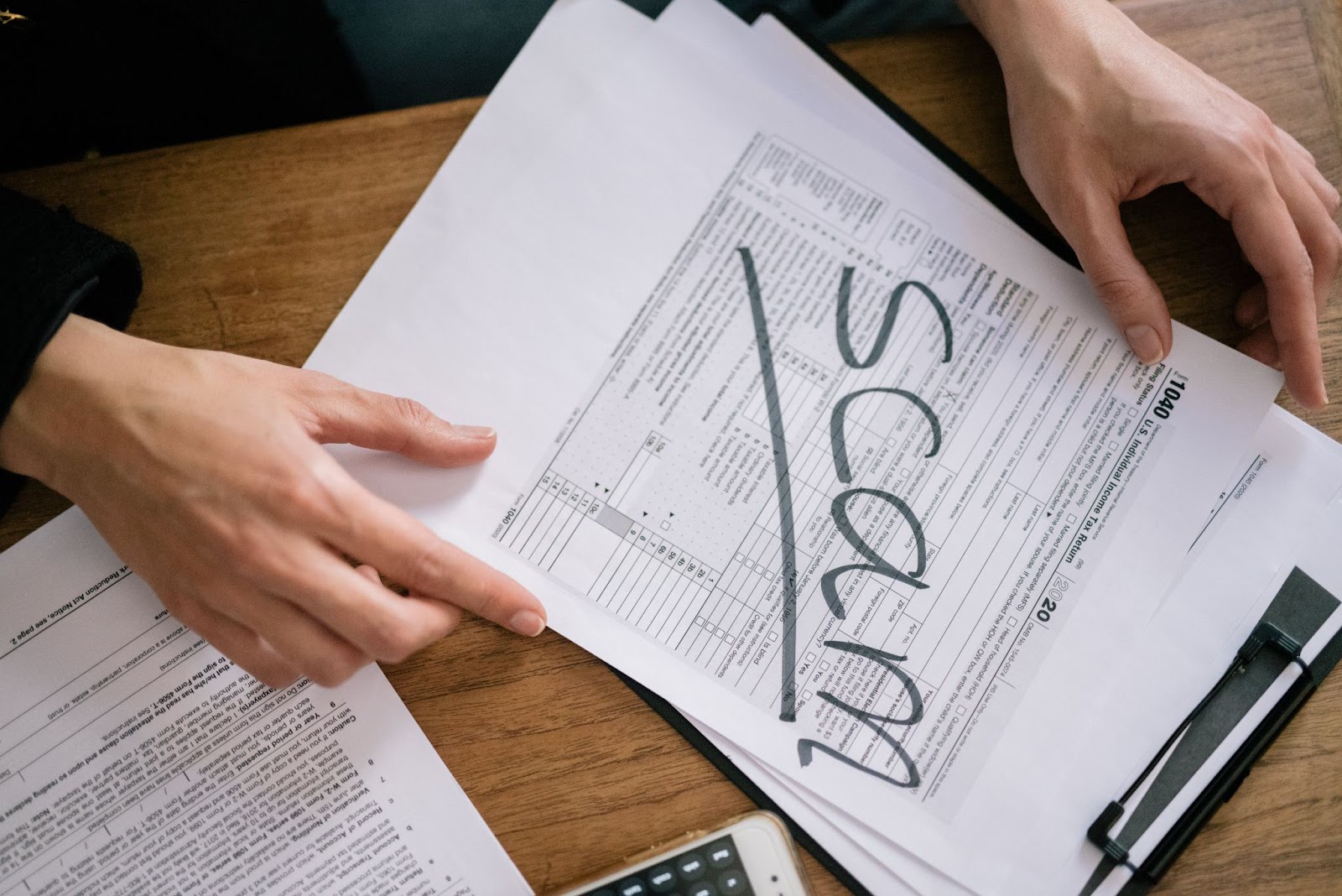What does falsifying business records mean